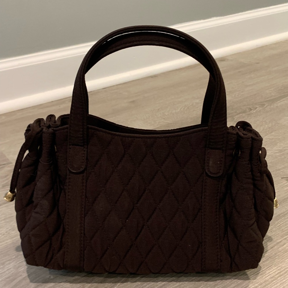 Chocolate Vera Bradley mini handbag.